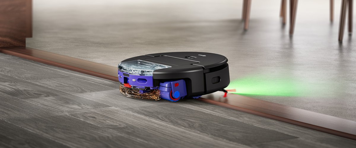 Dyson robots putekļsūcējs pārvar slieksni uz grīdas, tīrot dažāda veida grīdas segumus